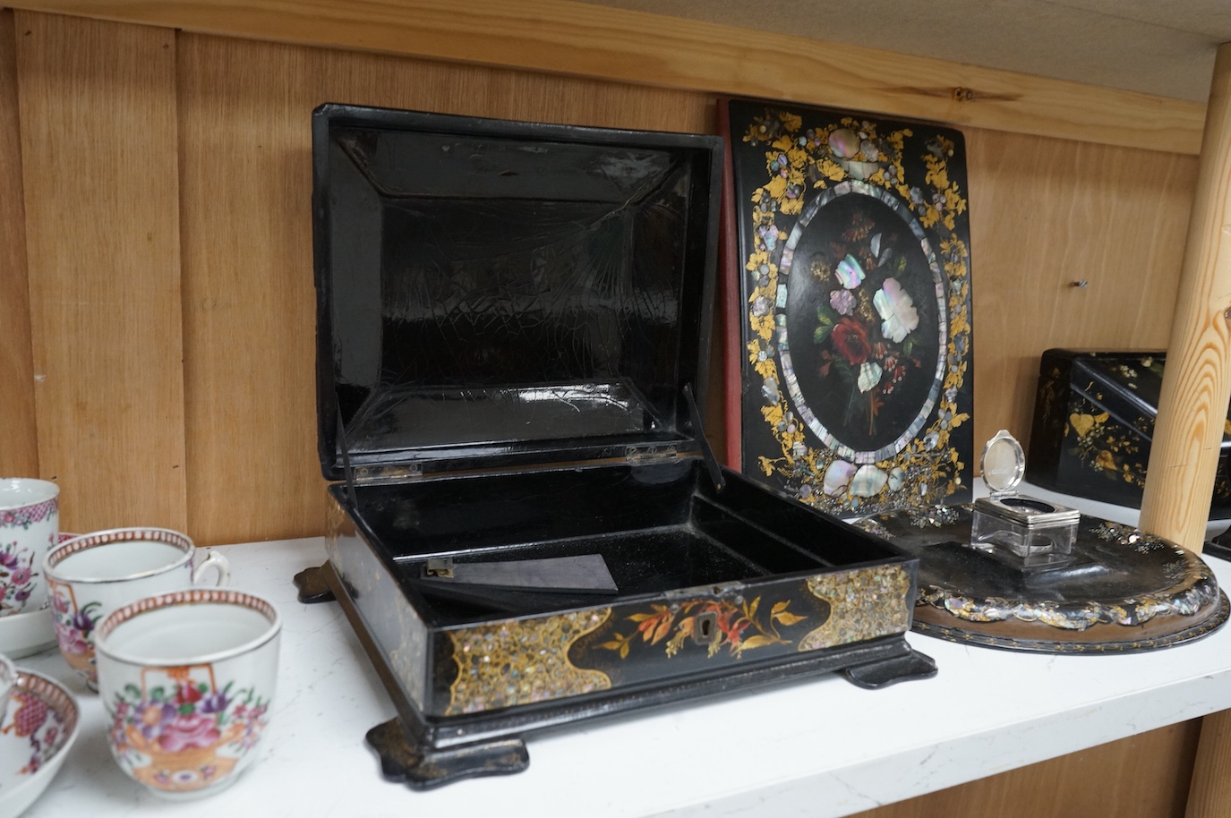 A group of Victorian japanned papier-mâché desk items and boxes (5). Blotter 24cm wide x 31cm high